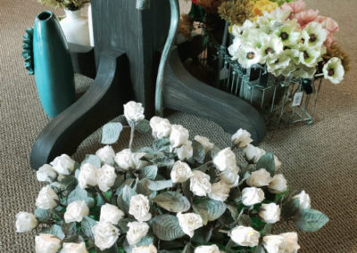 Silk Flowers in Decorative Spigot Basket